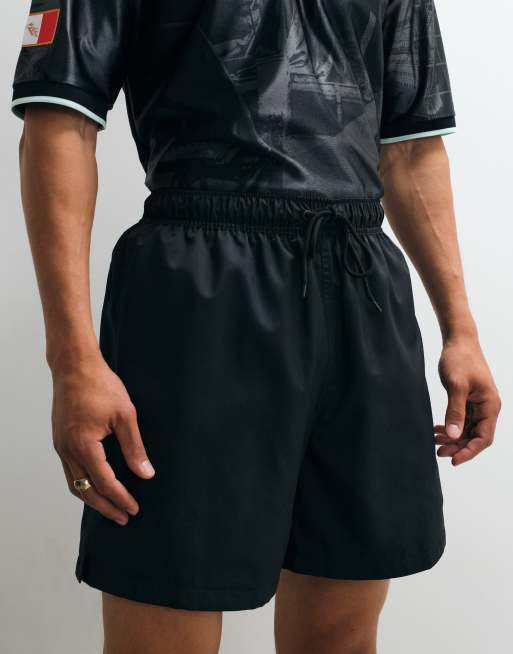 Pantalones cortos negros de punto de Nike Club, 4 de 7