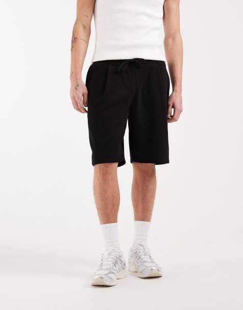 Pantalones cortos negros extragrandes de punto de ASOS DESIGN - view 1
