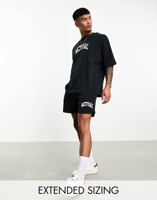Pantalones cortos negros holgados de estilo deportivo con logo multicolor de ASOS Actual (parte de un conjunto)