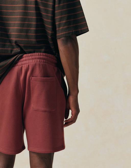 Pantalones cortos rojos básicos extragrandes de largo medio de punto liso Essentials de ASOS DESIGN, 3 de 5