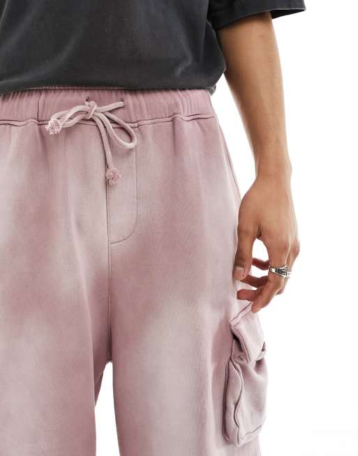 Pantalones cortos rosa lavado cargo extragrandes unisex con bajos sin rematar de ASOS DESIGN, 3 de 5