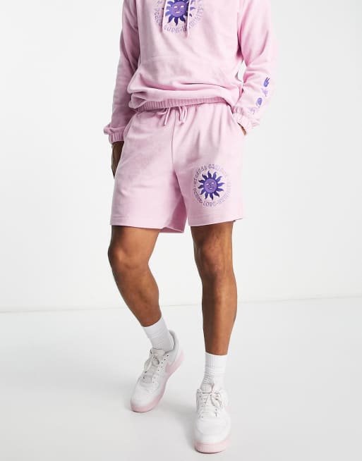 Pantalones cortos rosas holgados con detalle bordado de tejido de rizo de ASOS DESIGN