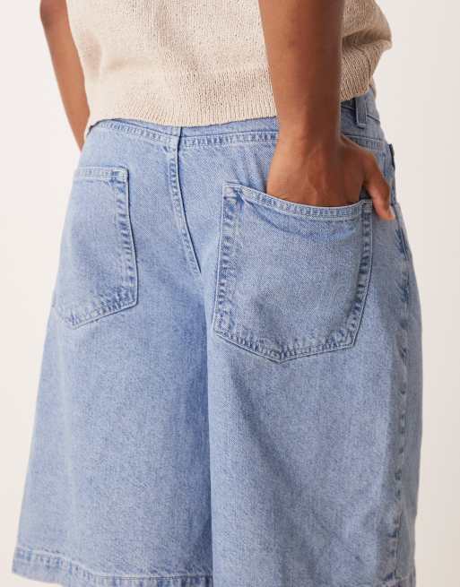 Pantalones cortos vaqueros azules de corte alargado con lavado medio de ASOS DESIGN, 3 de 5