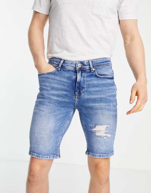 Pantalones cortos vaqueros azules de corte pitillo con roturas de River Island