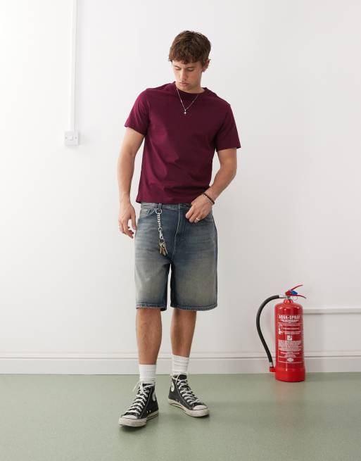 Pantalones cortos vaqueros azules holgados con lavado oscuro descolorido Galaxy de Weekday