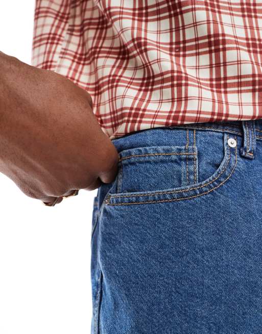 Pantalones cortos vaqueros azules sueltos de corte medio de JJ Rebel , 2 de 5