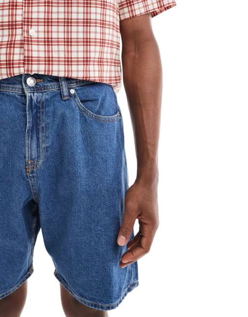 Pantalones cortos vaqueros azules sueltos de corte medio de JJ Rebel , 4 de 5