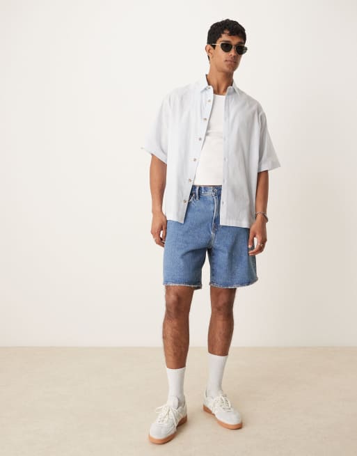 Pantalones cortos vaqueros azules sueltos de estilo deportivo con lavado medio de Abercrombie & Fitch
