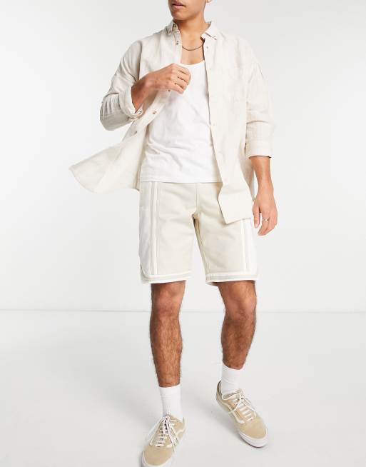 Pantalones cortos vaqueros color de estilo baloncesto de Topman |