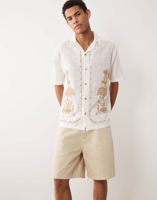 Pantalones cortos vaqueros color crudo de largo medio de ASOS DESIGN