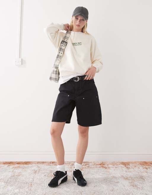 Pantalones cortos vaqueros de corte alargado recto con lavado negro descolorido y diseño de paneles de Obey