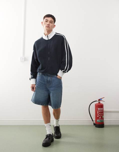 Pantalones cortos vaqueros de talle medio con lavado medio X004 de COLLUSION - view 1