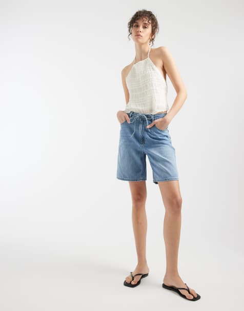 Pantalones cortos vaqueros estilo bermudas de talle medio con lavado azul claro y lazada en la cintura Villa de Vero Moda - view 1