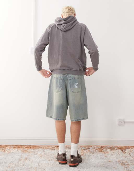 Pantalones cortos vaqueros holgados con lavado azul descolorido OG de Karl Kani