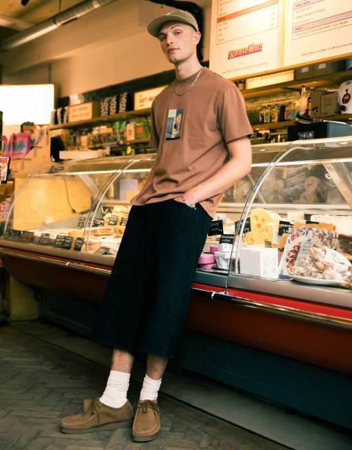 Pantalones cortos vaqueros negros de corte alargado de Topman
