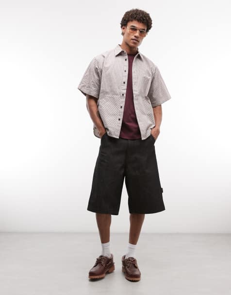 Pantalones cortos vaqueros negros de corte alargado holgado con abertura y bolsillo trasero bordado de XLARGE - view 1