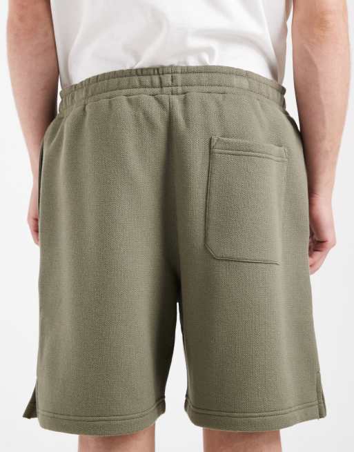 Pantalones cortos verde oliva extragrandes de punto de piqué de ASOS DESIGN (parte de un conjunto), 4 de 5