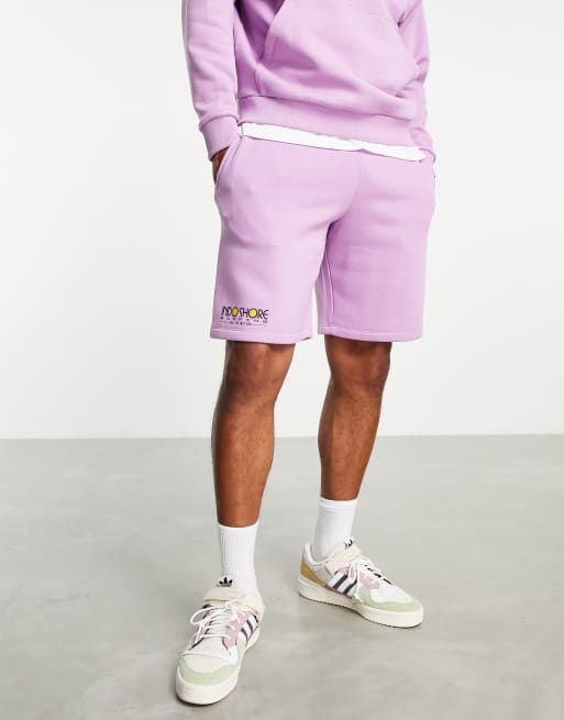 Pantalones cortos violetas holgadas con texto estampado de ASOS DESIGN (parte de un conjunto)