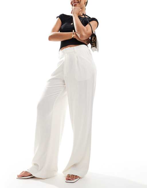Pantalones dad color crema de pernera ancha de mezcla de lino de ASOS DESIGN , 3 de 5