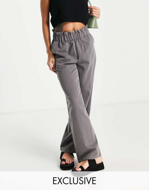 Pantalones dad grises con cinturilla paperbag exclusivos de Noisy May