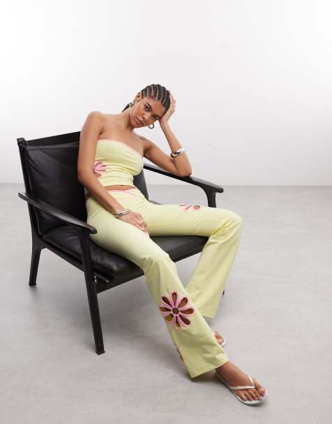 Pantalones de campana amarillos y rosas con detalle floral calado en contraste de tejido rico en algodón Daisy de I.AM.GIA (parte de un conjunto) - view 1