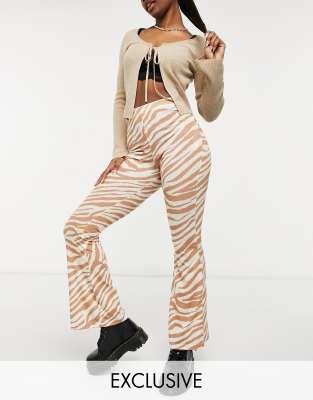 Pantalones cebra campana Clearance