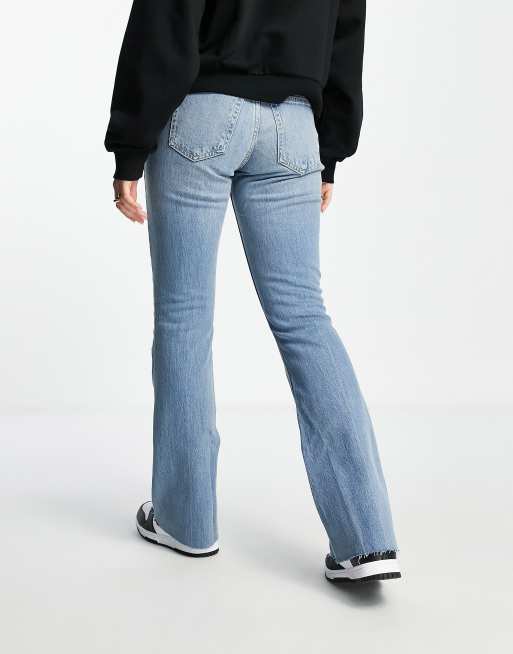 Pantalones de campana con lavado claro estilo años 70 de ASOS DESIGN, 2 de 4