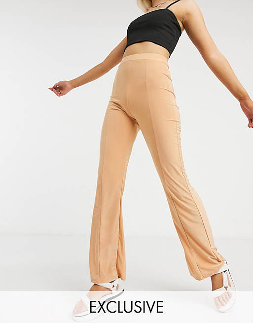Pantalones de campana estilo disco con detalle de costuras en color blush de COLLUSION