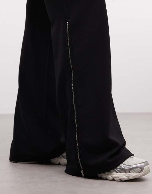 Pantalones de campana negros con detalle de cremallera lateral de Weekday, 5 de 5