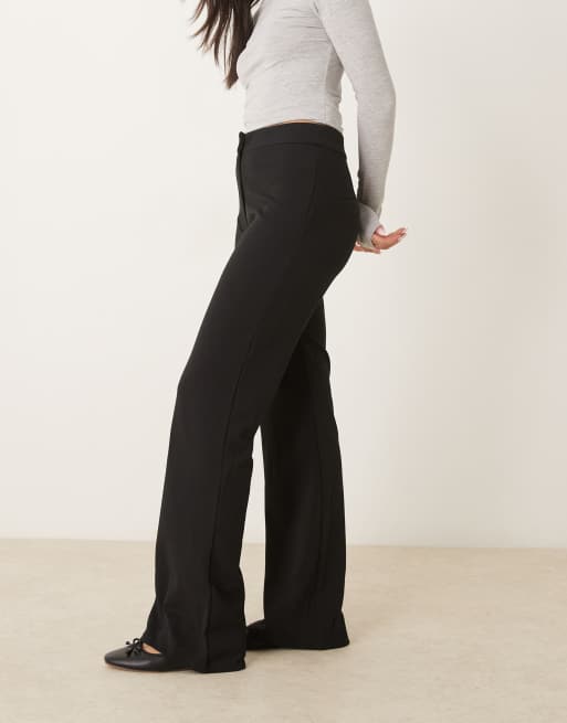 Pantalones de campana negros elásticos de talle alto de YAS, 2 de 5