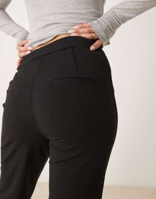 Pantalones de campana negros elásticos de talle alto de YAS, 4 de 5