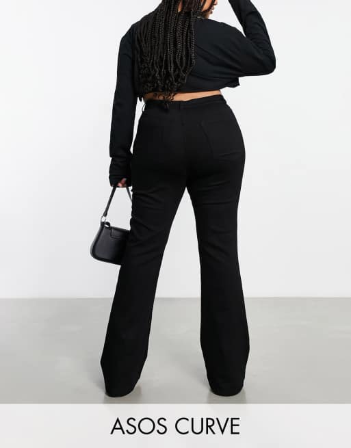 Pantalones de campana negros muy elásticos exclusivos de ASOS DESIGN Curve