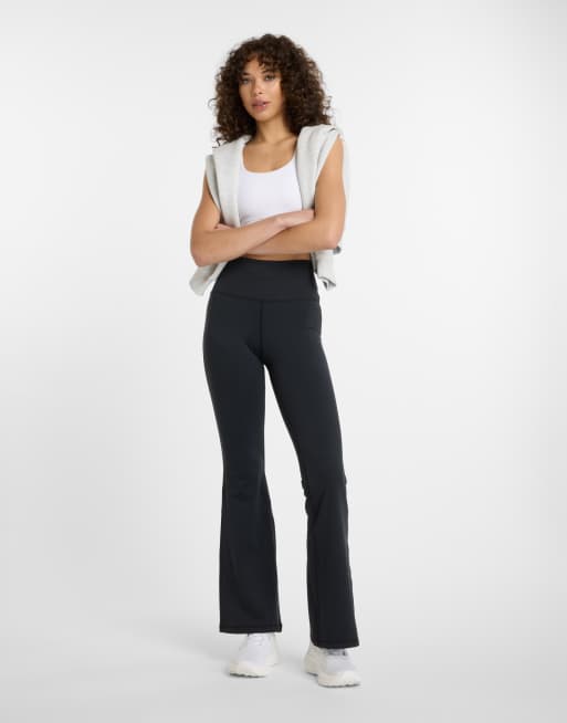 Pantalones de campana negros NB Harmony de New Balance