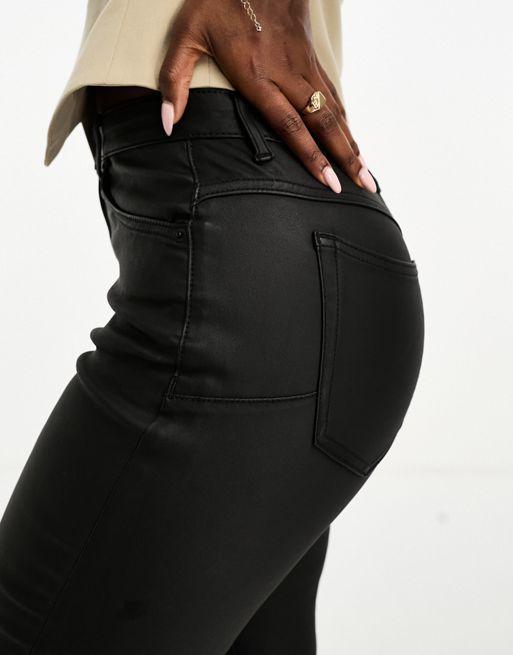 Pantalones de campana negros push-up elásticos con acabado revestido de  ASOS DESIGN