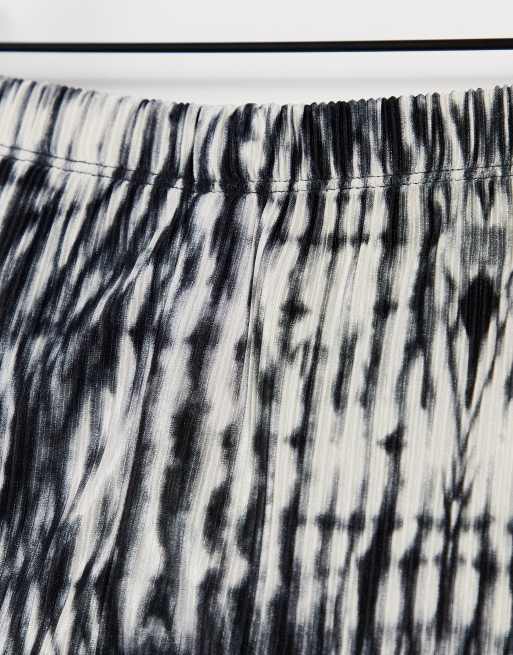 Pantalones de campana plisados con diseño tie dye de Topshop, 3 de 4