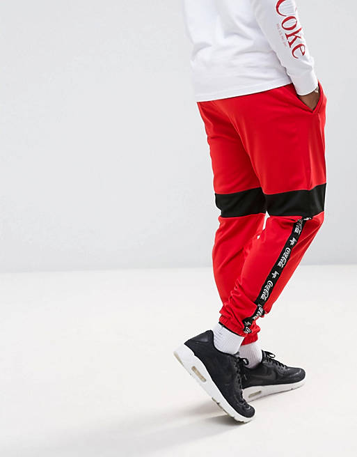 tirano Suburbio sofá Pantalones de chándal ajustados en rojo con ribete de Hype x Coca Cola |  ASOS