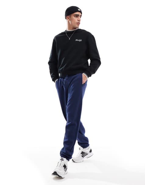 Pantalones de chándal azul añil holgados con bajos ajustados de Cotton On - view 1