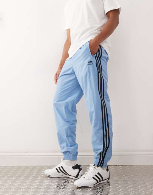 Pantalones de chándal azul ceniza y negros Adicolor Firebird de adidas Originals