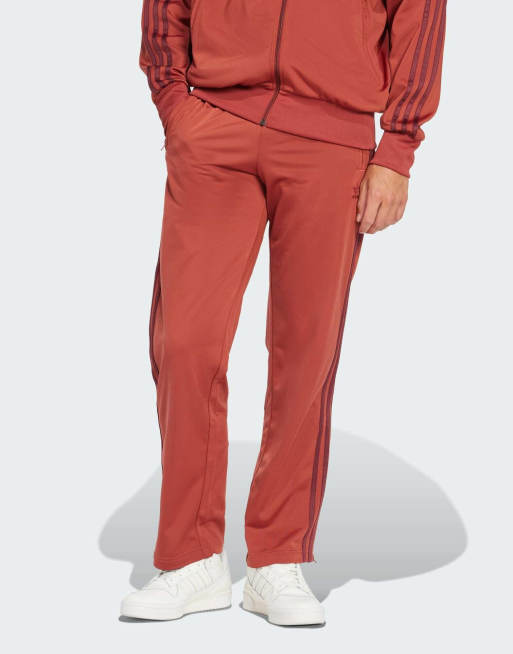 Pantalones de chándal color óxido Firebird de adidas Originals