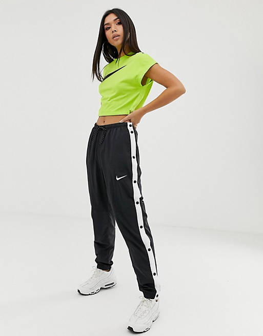 invadir De trato fácil Anfibio Pantalones de chándal con botones de presión en negro y blanco de Nike |  ASOS