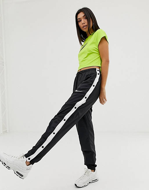 invadir De trato fácil Anfibio Pantalones de chándal con botones de presión en negro y blanco de Nike |  ASOS