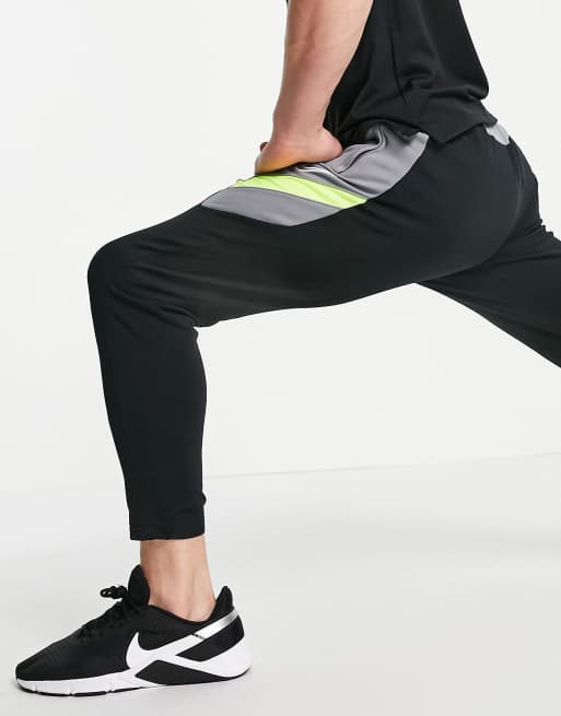 Pantalones nike store con raya