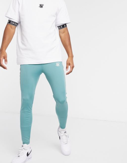 Pantalones de chandal siksilk hot sale