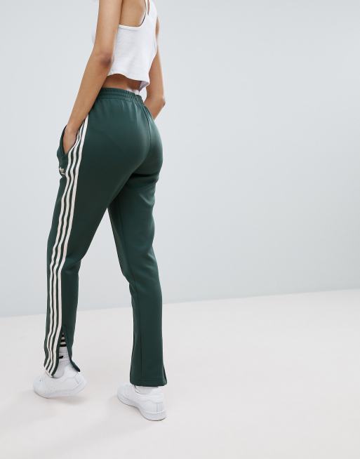 Pantalon adidas verde con rayas hotsell