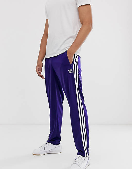 Gárgaras Gracias por tu ayuda Variante Pantalones de chándal en violeta Firebird de adidas Originals | ASOS