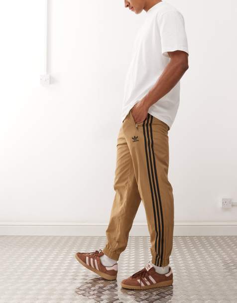 Pantalones de chándal marrones y negros Firebird de adidas Originals - view 1