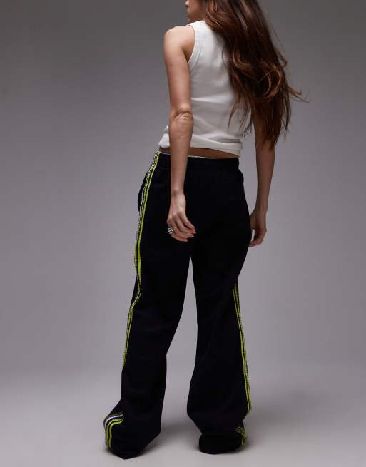 Pantalones de chándal negros con cremallera y detalle a rayas de Lacoste , 3 de 5