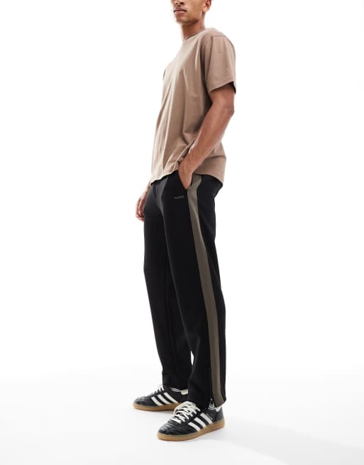 Pantalones de chándal negros holgados con logo Dolos de HUGO RED, 3 de 5