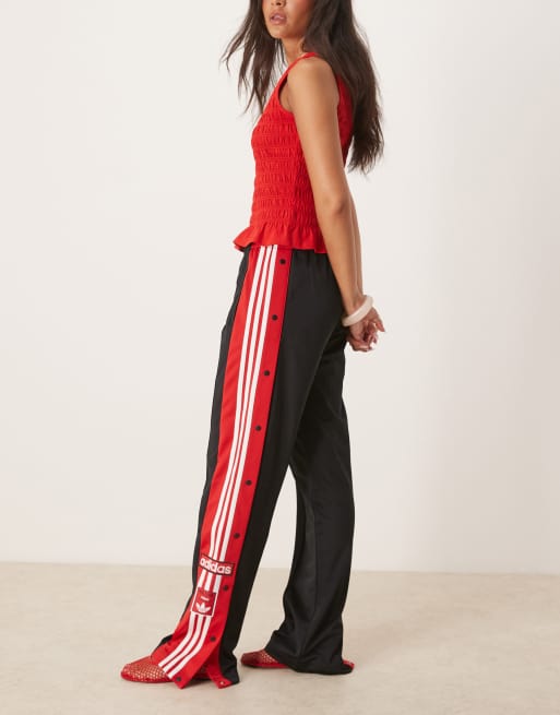 Pantalones de chándal negros y rojos Adibreak de adidas Originals