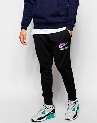 Pantalones de chándal pitillo con bajo ajustado de Nike | ASOS